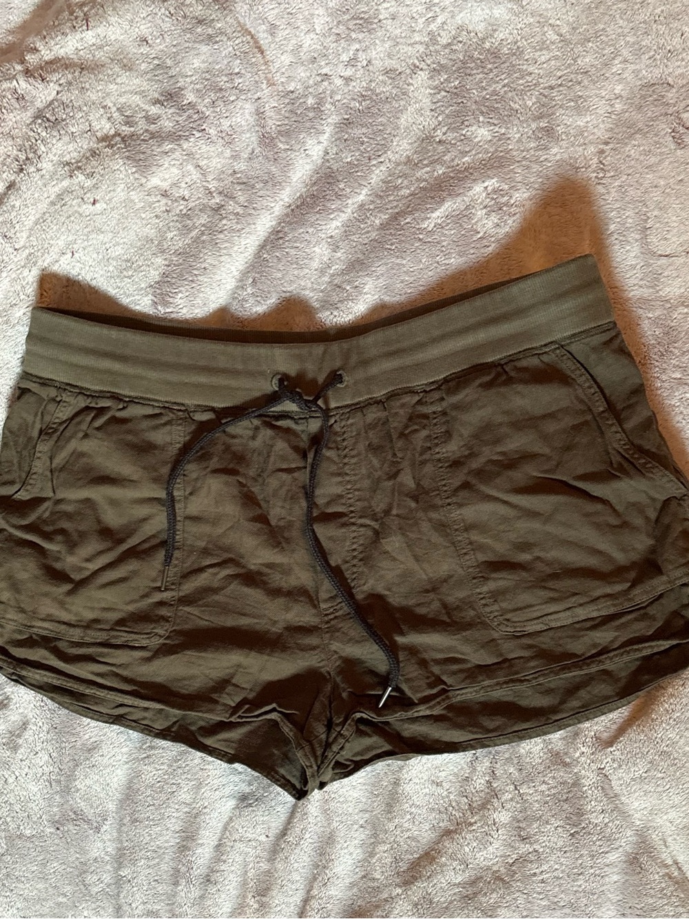 green drawstring shorts